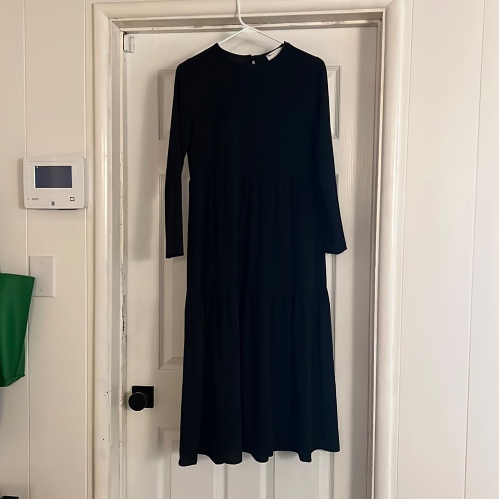 Never worn. Bought while pregnant for work but never wore it.
